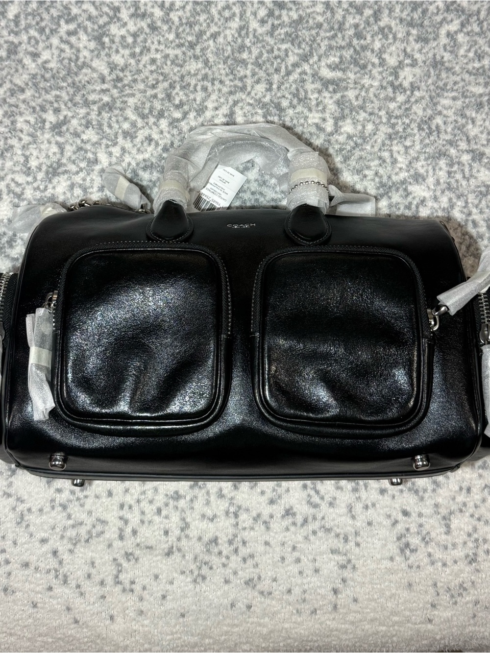Coach Compass Bag 35
With Pockets